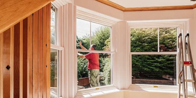 Cosello Construction bay window installation in a South Jersey home with natural light streaming in