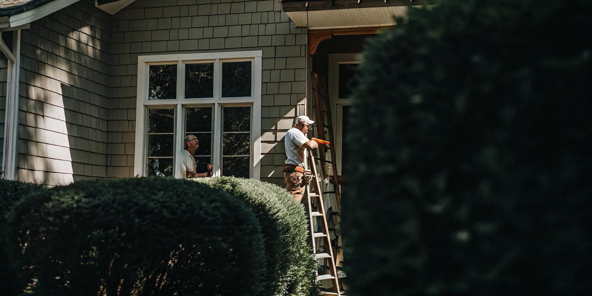 Professional window installation on a South Jersey home exterior, showcasing quality craftsmanship and curb appeal