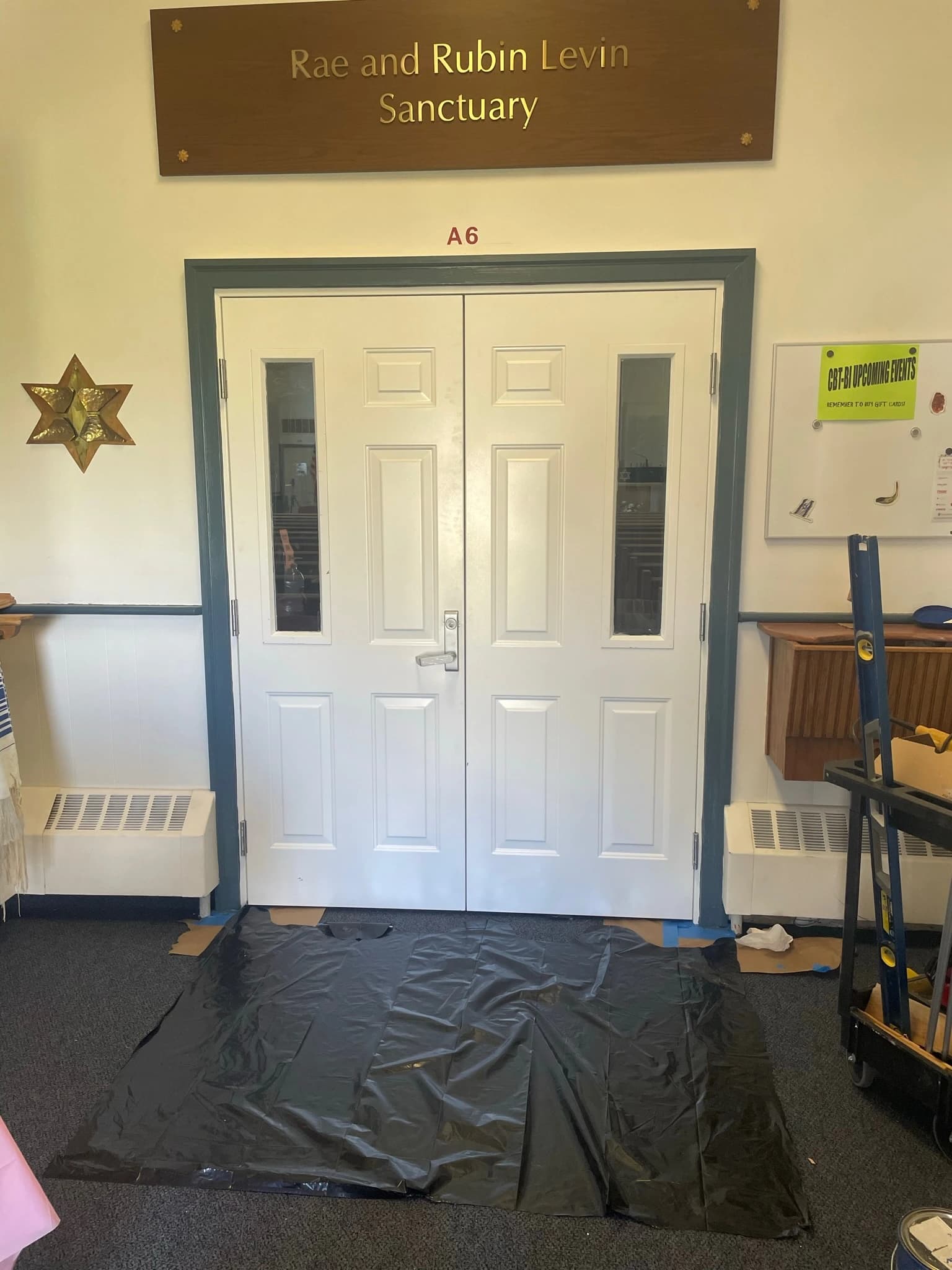 Commercial entrance door installation for a retail storefront by Cosello Construction